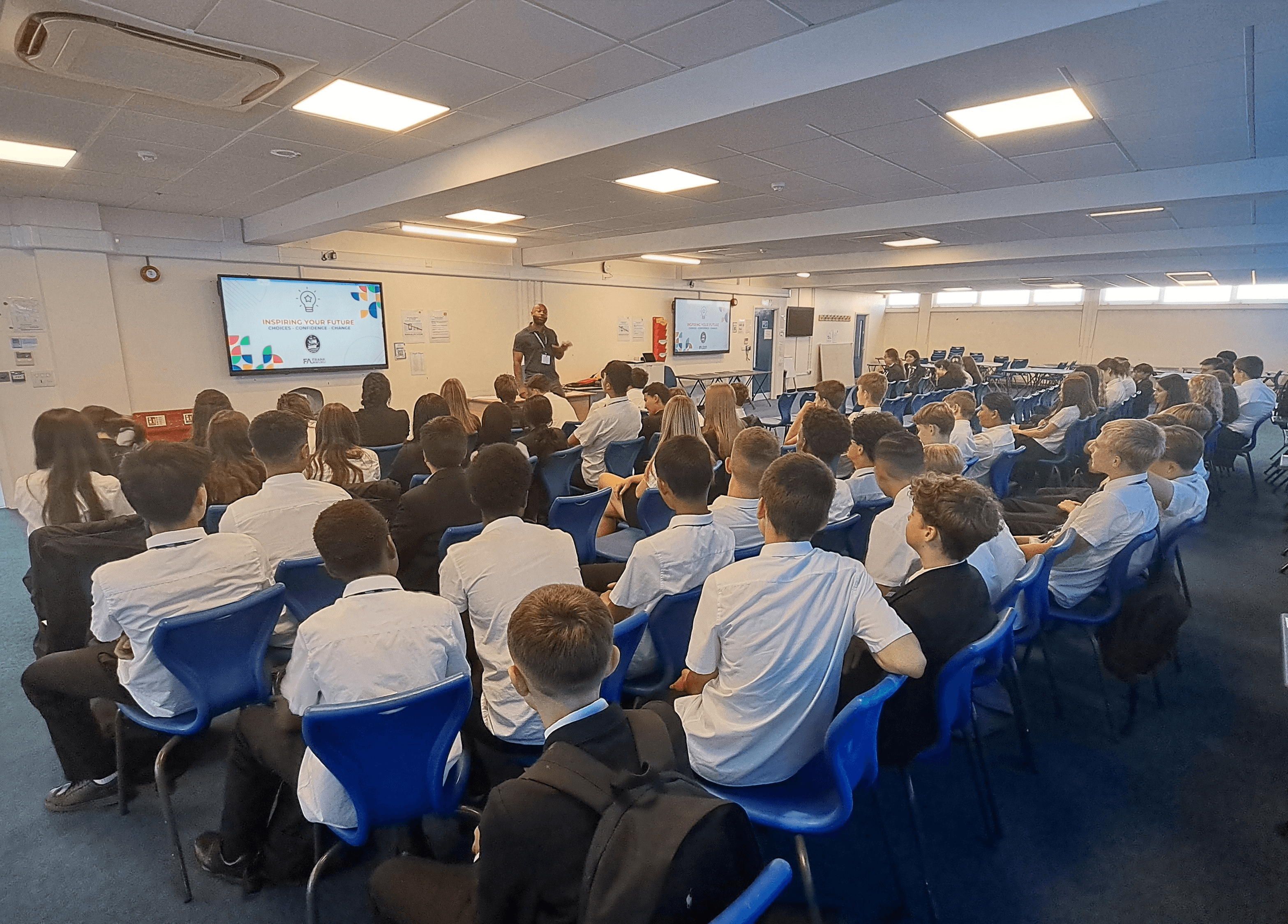 Frank delivering a keynote to a school staff audience